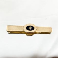 Kreisler tie clip in a very traditional design of black, gold-filled, and silver.  Kriesler made high quality and expensive jewelry and accessories that were very popular, and still are. Signed pieces are go for a fair amount of money, and the few offered at a reasonable price usually go very fast.This is 1/20 12k gold filled, which is a layer of 12k gold physically bonded to a copper core. It is NOT plated, and wears like real gold. There is a bit of dulling and scratches to the metal on back, Lapidary Supplies, Vintage Fine Jewelry, Couture Jewelry, Bar Items, Tie Bar, Expensive Jewelry, Silver Spring, Vintage Handbags, Vintage Costume Jewelry