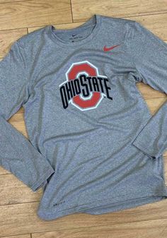 Nike Ohio State Buckeyes Grey Legend Logo Long Sleeve T-Shirt - 19861506 Dri-fit Crew Neck Top For Sports Season, Casual Moisture-wicking Top For College, Long Sleeve T-shirt For Sports With School Spirit, Team-colored Casual Top With Moisture-wicking, Casual Moisture-wicking Team-colored Top, Casual Team-colored Top With Moisture-wicking, Athleisure Moisture-wicking T-shirt For College, Casual Athletic Heather T-shirt For Game Day, Collegiate Long Sleeve Sports T-shirt