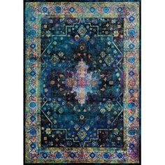 a blue rug with an intricate design on the front and back side, in various colors