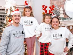 Celebrate Christmas with this personalized family Christmas tree sweatshirt. Perfect for Mom, Dad, youth, toddler and baby. This custom family matching Christmas shirt is fun, festive and will create the most stylish family photo. The design includes four Christmas trees, lights and a space for personalized custom text (i.e., the family name) underneath the message "Merry & Bright''. This Christmas sweater is available in white (adult, youth, toddler & baby) and sport grey (adult & youth) - see Christmas Sweaters Family, Trees Lights, Family Christmas Tree, Family Matching Christmas, Matching Christmas Shirts, Merry Bright Christmas, Bright Christmas, Suit Style, Family Matching