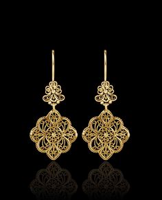 Indulge in the exquisite craftsmanship of these gold-plated 925 sterling silver filigree art flower-shaped women's dangle drop earrings. These stunning earrings are designed with intricate floral details and feature delicate filigree work, creating a stunning visual effect. The earrings measure 1.90 inches in length, 0.90 inches in width, and have a drop length of 0.90 inches. The oxidized finish gives them a unique antique look, and they are highly polished to create a brilliant shine. They com Filigree Gold Jewellery, Drop Gold Earrings, Pearl Earrings Designs, Gold Jewellry, Art Jewelry Design, Drop Earrings Gold, Jewelry Drawing, Filigree Jewelry, Silver Lace