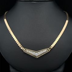 -Stone(s)- (9) Natural Genuine Diamond - Round Brilliant Cut - Prong Set -  Brilliant White Diamonds - 0.56ctw (approx.) Material: Solid 18k Yellow Gold Weight: 21.48 Grams Chain Type: 17" - 3.55mm Flat "S" Link  - Spring Ring Clasp Chevron Height: 12.70mm (0.50") (approx.) Chevron Width: 33.86mm (1.33") (approx.) Chevron Thickness: 3.68mm (at center) Condition: Vintage, excellent condition! Stock Number: JO-780137131-PAR Link Chain Necklace, Chain Link Necklace, Spring Rings, Link Chain, Diamond White, Prong Setting, Chains Necklace, Chain Necklace, Jewelry Necklaces