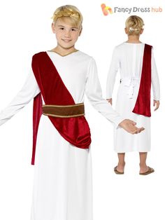 a young boy dressed in an ancient roman costume with red and white trimmings