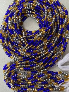 Thank you for your interest in purchasing Bulk/wholesale Waist Beads. Please Note:**These Waist beads Ship from Ghana, West African. They are traditional and authentic yet Fancy and fashionable.*** Shipping takes 3-5 days to be delivered*** I will send you nice selection of the beads unless you want to make your own choices, then you can email me to send You individual pictures of he waist beads#Waist beads sizes Varies from 35"- 45"# They are all made with cotton threads# Bead sizes vary from 6 Faceted Round Beads For Festival, Traditional Party Waist Beads, Faceted Oval Beads For Festival, Oval Faceted Beads For Festivals, Traditional Beaded Bracelets With Faceted Beads For Party, Blue Bohemian Beads For Festive Occasion, Bohemian Blue Beads For Festive Occasions, Colorful Round Beads For Celebration, Traditional Blue Faceted Beads