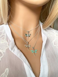 "Beautiful sterling silver dragonfly pendant necklace with turquoise, abalone shell or mother of pearl. All handcrafted. Stamped 925 * Pendant measurements: 18 x 27 mm * Made in Italy chain is optional Two lengths (adjustable) available:  1) 16 - 18\"  -  40 - 45 cm 2) 18 - 20\"  -  45 - 50 cm 925N-008" Turquoise Sterling Silver Charm Necklace, Bohemian Silver Dragonfly Necklace, Silver Dragonfly Jewelry, Rose Gold Choker Necklace, Rose Gold Choker, Dragonfly Pendant, Paua Shell, Baroque Pearl Necklace, Garnet Pendant