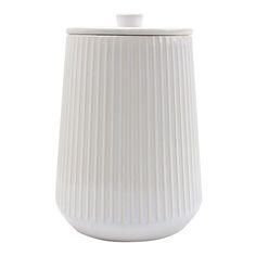 a white ceramic jar with a lid on a white background, it looks like pleated ribbings