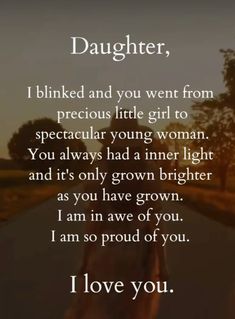 a person walking down a road with the words daughter on it