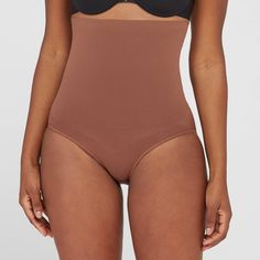 Talk about results! This lightweight brief uses targeted zones to tone your tummy and give you a perky rear view. The high waist offers added tummy control and eliminates muffin top without digging in, while the seamless design provides all-day comfort and support that won't show through (bye, visible panty lines!). Color: Chestnut Brown. Gender: female. Age Group: adult. Pattern: Solid. Material: Nylon. Fitted Seamless Brown Bottoms, Fitted Brown Shapewear Bottoms, Seamless Brown Shapewear, High-waist Sculpting Bottoms With Seamless Construction, High Waist Sculpting Bottoms With Seamless Construction, High Waist Sculpting Seamless Bottoms, Supportive Shapewear Bottoms With Wide Waistband, Fitted Seamless Brown Shapewear, Sculpting High-waist Bottoms With Seamless Construction