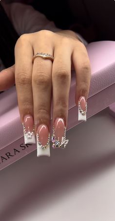 Clear Gem Nails, Nails Latina Medium, French Tip Acrylic Nails With Gems, Nails With Pixie Crystals, Extra Birthday Nails Medium Length, Nail Inspo Rhinestones, French Tip Acrylic Nails With Design, French Tip With Charms, French Tips With Gems