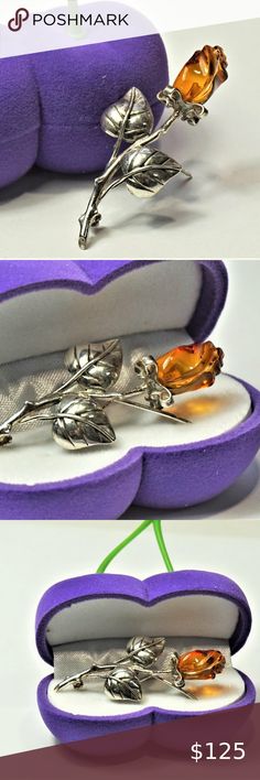 AMBER ROSE PETITE BROOCH 925 SILVER MOTHER'S GIFT RARE ESTATE FINDS! GORGEOUS PETITE AMBER ROSE! ARTISAN UNIQUE GENUINE AMBER & STERLING SILVER DETAILED ROSE WITH LEAVES. 2" long. STAMPED 925 Sterling Silver. READY TO GIFT IN BEAUTIFUL CHERRY GIFT BOX! IN EXCELLENT NEW CONDITION! GREAT GIFT FOR MOTHER'S DAY! VESSEL Jewelry Brooches Amber Brooch Jewelry Gift, Hallmarked Sterling Silver Brooches For Anniversary, Sterling Silver Hallmarked Brooches For Anniversary, Sterling Silver Brooches For Anniversary, Rose Flower Brooch Gift, Gold Sterling Silver Brooches For Gift, Gold Sterling Silver Brooches As Gift, Elegant Rose Design Brooches For Anniversary, Sterling Silver Hallmarked Brooches