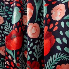 the curtains are decorated with red flowers and green leaves on black background, closeup