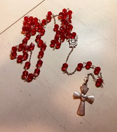 Handmade rosary made with red beads. Ask me about custom pieces! Handmade Red Rosary Bracelet With Round Beads, Red Handmade Adjustable Rosary Bracelet, Handmade Red Rosary, Adjustable Red Rosary With Round Beads, Adjustable Red Rosary With 8mm Beads, Handmade Rosary, Red Beads, Red Bead, Ask Me