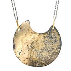 Recycled oxidized Argentium silver fused with fair-mined 18k gold // Smooth 18k fused gold melds seamlessly with textured 18k gold dust, evocative of the moon’s surface // Handmade solid 18k recycled gold jump rings // Approx. 2.75” in diameter // On a 30” oxidized silver cable chain - doubled up on each side // Complete with a handmade oxidized silver ‘S’ clasp Hand Forged Moon-shaped Gold Jewelry, Gold Hammered Half Moon Jewelry, Hand Forged Moon Shaped Gold Jewelry, Hammered Gold Half Moon Jewelry, Gold Hand Forged Round Pendant Necklace, Gold Electroformed Round Jewelry, Gold Oxidized Round Pendant Necklace, Gold Necklace With Oxidized Round Pendant, Gold Necklace With Oxidized Finish And Round Pendant