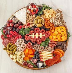 a platter filled with lots of different types of food