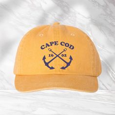 "Cape Cod 1602 Hat, Cape Cod Hat, Massachusetts Cap, Vacation Hat, Cape Cod Souvenir Cap, Summer Hat, Beach Hat, Embroidered Hat We use DTF Vinyl Heat Pressed Design. Mega Cap - Pigment Dyed Cotton Twill Cap - 7601A - 100% cotton pigment dyed twill - Unstructured, six-panel, low profile - Self-fabric sweatband and six sewn eyelets - Self-fabric strap with brass snap buckle and sewn grommet - Adult Sizing: 6 5/8\" - 7 3/8\"" Vintage Baseball Cap With Curved Brim For Beach, Vintage Curved Brim Baseball Cap For Beach, Beach Dad Hat With Flat Bill, Vintage Snapback Hat For Vacation, Beach Trucker Hat With Embroidered Logo And Curved Brim, Trucker Hat With Embroidered Logo For Beach, Vintage Beach Hat With Curved Bill, Beach Dad Hat With Embroidered Logo, Vintage Curved Bill Beach Hat