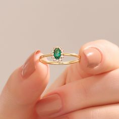 14k 18k 10k Real Solid Gold Minimalist Tiny Oval Cut Emerald Halo Promise & Floral Engagement Ring for Women with Yellow Rose White Gold Options. This Deep Green Small Gemstone Ring is the excellent anniversary gift for wife. Perfect minimal jewelry for everyday use and to complete your each look with a simple touch by Norm Jewels. Ring Details ❥ Gold KT: 14k 18k 10k Solid Gold ❥ Gold Color Options: Yellow Gold, White Gold, Rose Gold ❥ Band Width: 1.36 mm ❥ Ring Width: 7.69x5.85 mm ❥ Thickness: Fine Jewelry 14k Gold Emerald Ring With Halo, 14k Gold Emerald Ring With Halo Design For Promise, 14k Gold Emerald Ring With Halo Detail, Dainty Yellow Gold Emerald Open Ring, Dainty 14k Gold Halo Ring, Dainty Oval Cluster Ring In 14k Gold, Dainty 14k Gold Oval Cluster Ring, 14k Gold Emerald Halo Promise Ring, Emerald Ring With Halo Design In 14k Gold