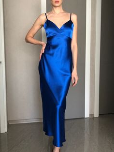 This silk satin slip dress can be worn as a bridesmaid dress, party and date dress and for many other occasions. Made of satin silk. DESCRİPTİON: -Adjustable straps. -Designed for a slim but relaxed fit. -Unlined. İt is a custom made dress, tailored according to your preferences, you can choose the length of the dress and order it with cut on the front. While ordering write your bust, waist and hips measure, so the dress will be made to your size. Please enquire if you're interested in different Silk V-neck Slip Dress For Prom, Satin Evening Dress With Spaghetti Straps For Bridesmaid, Bridesmaid Evening Dress With Spaghetti Straps In Satin, Formal Satin Finish Slip Dress For Prom, Blue Sleeveless Satin Dress For Prom Season, Blue Sleeveless Satin Dress For Prom, Satin Bias Cut Evening Dress With Spaghetti Straps, Satin Spaghetti Strap Evening Dress Bias Cut, Summer Evening Satin Dress With Spaghetti Straps