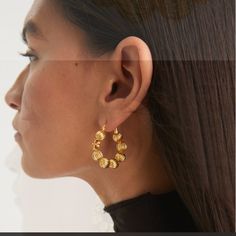 Bold And Sculptural, The Roxanne Earring Features A Series Of Fluted Beads. In Lightweight Brass With A Carved Double T, It Has The Look Of Vintage Jewelry . Vintage Jewelry. 18k Gold-Plated Brass Latch-Back Posts. For Pierced Ears. Diameter: 0.8" (1.9cm) Elegant Hammered Gold Plated Hoop Earrings, Elegant Hammered Hoop Earrings, Elegant Hammered Round Hoop Earrings, Elegant Hammered Hoop Earrings For Anniversary, Hammered Hoop Earrings For Anniversary, Elegant Hammered Hoop Earrings For Party, Gold Beads Drop Earrings, Elegant Dangle Hoop Earrings With Gold Beads, Elegant Gold Beaded Hoop Jewelry