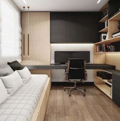 a bedroom with a bed, desk and computer monitor on it's stand up shelf