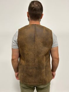 Perfect for three seasons, with the choice to layer on cooler days. Our sheepskin vest are durable, stylish and 100% natural allowing for your body to regulate warm in a productive way. Do you hate how body heat feels from polyester or synthetic fabrics? Then natural sheepskin and wool is the right choice for you. Our vest are made from Merino shearling sheepskin that hasn’t been treated with chemicals that are harmful to the skin. _____ Rugged Winter Vest For Outdoor Activities, Rugged Outdoor Winter Vest, Rugged Brown Vest For Fall, Rugged Brown Winter Vest, Brown Rugged Winter Vest, Brown Rugged Vest For Winter, Fitted Sleeveless Rugged Outerwear, Leather Winter Outdoor Vest, Rugged Brown Vest Outerwear