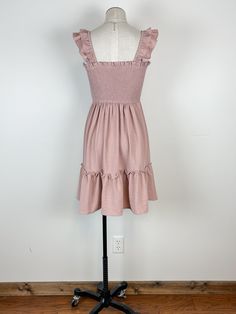 Get ready to slay in our Kori Ruffle Strap Smocked Dress! Its ruffle straps and square neck add a playful touch, while the embroidered and smocked bodice provide a flattering fit. And don't forget the flirty ruffle trim. Available in mauve. Length: 35" 100% Polyester Brand: Hem & Thread Curvy Shorts, Coastal Chic, Judy Blue Jeans, Curvy Dress, Blue Gifts, Smocked Dress, Sweater Blouse, Dress Romper, Hat Hairstyles