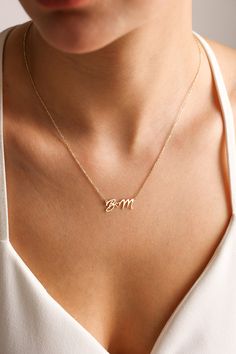 "Gold personalized initial necklaces has a small heart right on middle and these dainty necklace great personalized jewelry idea to yourself, best friends or any women. They going to love this special pendant necklace. Our gold initial pendant couple necklaces is  great way to make any women happy with minimalist necklace design. 💖  ♥ Personalized piece for yourself or for someone special in your life.. ♥ Make your choice from this custom necklace for baby shower gifts, new mom gifts, Mothers Day gifts, birthday gifts, gift for mom and anniversary gifts. Amazing gift for her..  ✋ All our jewelry is %100 custom made by hand with Love and Care in our workshop! Nickel Free High Quality Materials Standard Deliver in 8-12 Business Days *How to customize name necklaces? Leave a not at \"Note to Sentimental Necklace For Girlfriend, Boyfriend Name Necklace For Her, Initials Pendant Necklace, Letter Gold Necklace, Simple Personalized Initial Pendant Charm Necklaces, Simple Personalized Initial Pendant Charm Necklace, Simple Personalized Pendant Charm Necklace, Delicate Personalized Initial Necklace For Gift, Minimalist Name Pendant Charm Necklace