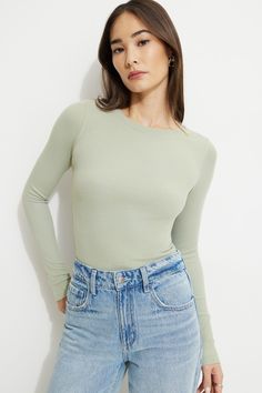 This long-sleeved crew neck tee was designed with the perfect fit in mind. This style blends organic cotton for a luxurious handfeel while subtle details elevate its blank canvas-like function. Features - Crewneck - Long sleeves - Luxurious handfeel Size & Fit - Fitted - Stretch fabric Materials & Care - 58% Organic Cotton, 38% Modal, 4% Spandex - Machine wash, cold - Imported Weekend Outfit, Blank Canvas, New Tops, Online Sales, Crew Neck Tee, Fabric Material, Long Sleeve T Shirt, Stretch Fabric, Long Sleeve Tshirt