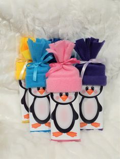 Please include the names you want on them and the color hats you would like in the notes. Thank you! Similar to our baby bars, these cute Hershey bars look like adorable winter penguins. Awesome for a small gift or stocking stuffer. Or great for any event. Hats come in: purple, yellow, light green, pink, blue, red and green.  Ribbon shades may vary depending on what I can get.  Included in this price is: the hat, custom wrapper, colored foil, ribbon on the hat. And of course the Hershey bar! These are sure to be the talk of everyone you give them to! Not just for children, consider these as a secret Santa gift!  This is per bar prices. Please convo me for shipping and a custom order for the amount you need. Ships to the U.S. and Canada Chocolate Christmas Gift, Stuffers Stocking, Personalized Baby Shower Favors, Baby Bar, Christmas Prep, Unique Stocking Stuffers, Valentine Gifts For Kids, Chocolate Christmas, Hershey Bar