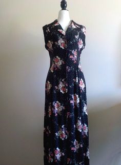 90's FLORAL SLEEVELESS MAXI Dress with buttons down the front/ Black with Pink/White/Purple Flowers/Collar/Size 9/10 Medium/Novelty Dress by JurassicPunk on Etsy #maxidress #90sdress #floraldress #noveltydress #buttondress #90s Fitted Collared Maxi Dress With Buttons, Fitted Floral Print Button-up Maxi Dress, Vintage Summer Maxi Dress With Buttons, Vintage Maxi Dress With Buttons For Summer, Fitted Button-up Maxi Dress For Daywear, Fitted Sleeveless Maxi Dress With Buttons, Button-up Floral Maxi Dress For Daywear, Purple Floral Print Maxi Dress For Daywear, Vintage Black Maxi Dress With Floral Print