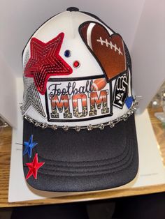 Football Mom themed Trucker Patch Hat. Message me your school colors.  These are the hottest trend on social media today. Great for festivals, concerts, night life and everyday wear. This foam trucker hat is fully adjustable and offered in hat colors Black, White, Light Pink, Neon Pink, Neon Yellow and Green Camouflage. Custom Hats avail. One size fits all. $35 Small Print: patch, mama, cowboy, hat, faith, rock and Roll, trucker, patch, cap, chain, iron on, sew on, festival, concert, neon, baseb One Size Hip Hop Trucker Hat For Baseball Season, Fun Snapback Hat With Letter Print For Streetwear, Fun Letter Print Trucker Baseball Cap, Trendy Hats For Baseball Season Sports Events, Trendy Snapback Trucker Hat For Baseball Season, Trendy Snapback Trucker Hat For Sports Events, Trendy Hats For Baseball Season, Fun Letter Print Trucker Hat, Adjustable Trucker Hat For Fan Gear