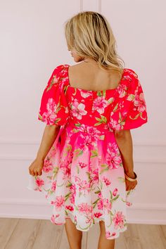 - Add a perfect pop of petals with this cutie! - Fully lined breezy material with a green and pink hued floral print - A v-cut neckline with a hidden snap for additional closure - Back zip closure - Short puff sleeves with elastic cuffs - A flowy and flattering silhouette that ends in a mini dress length hemline Pink Square Neck Dress With Rose Print, Pink Square Neck Floral Dress For Spring, Pink Floral Print Dress With Square Neck, Pink Flirty Floral Dress For Garden Party, Square Neck Pink Mini Dress For Garden Party, Flowy Square-neck Pink Mini Dress, Pink Rose Print Floral Dress For Summer, Pink Rose Print Summer Floral Dress, Pink Hibiscus Print Dresses For Spring