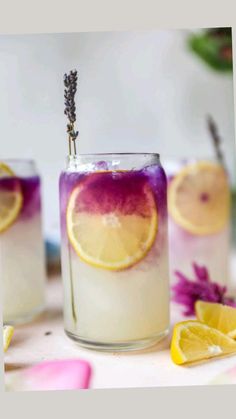 three glasses filled with lemonade and lavender