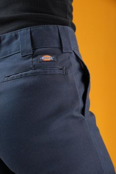 Classic workwear style pants by Dickies, in dark blue, made from a durable cotton and polyester blend.  In excellent condition, without any significant signs of wear.  The trousers are suitable for both men and women, although originally they are male pants. Size W30, L32. I am 175cm (5.9ft) tall and usually wear a size M.  Waist: 38 cm ~ 14.96 inches Hips: 50 cm ~ 19.69 inches Inner leg: 82 cm ~ 32.28 inches Total length: 106 cm ~ 41.73 inches ... Discount for multiple items, applies automatica Navy Cotton Cargo Pants With Hip Pockets, Navy Cargo Bottoms For Workwear, Navy Cotton Tapered Leg Work Pants, Blue Cotton Cargo Pants For Work, Navy Cotton Work Pants, Navy Cotton Work Trousers, Navy Cotton Straight Leg Work Pants, Navy Cotton Chinos For Work, Navy Work Pants With Pockets