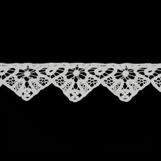 a white lace on a black background