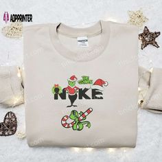 a white shirt with the words nnke on it and candy canes around it