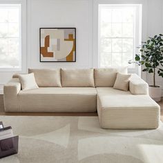 a living room with a large sectional couch