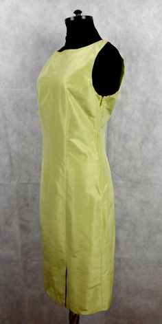 Elegant dress by Etro, sleeveless plain model with small slits in the front and rear, zip to the left,in pale green color, full lining. Made of 76% cotton, 24% silk, lining - 100% silk, made in Italy, size 42 Very well preserved Measurements taken flat: Length 99 cm / 39'' Shoulder width 35 cm / 13.7'' Waist 39 cm / 15.4'' Hips 47 cm / 18.5'' Fitted Sleeveless Light Green Dress, Sleeveless Dress With Back Zipper, Light Green Fitted Sleeveless Dress, Fitted Light Green Sleeveless Dress, Green Sleeveless Dress For Formal Summer Occasions, Green Sleeveless Dress For Formal Summer Events, Formal Green Sleeveless Dress For Summer, Summer Green Sleeveless Dress For Formal Events, Elegant Sleeveless Light Green Dress