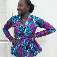 African Ankara Print Women Veroex Handmade Peplum Long Sleeve Top Blazer Made With Cotton Fabric Model Is Wearing Size 8 Contact Me For Any Questions About The Dress Fitted Purple Floral Print Top, Fitted Lavender V-neck Blouse, Purple Cotton V-neck Blouse, Fitted Purple Floral Print Blouse, Fitted Purple Chic Blouse, Chic Fitted Purple Blouse, Fitted Long Sleeve Purple Blouse, Fitted Purple Long Sleeve Blouse, Chic Purple Cotton Blouse