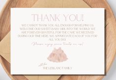 a thank card with a pink dress on it