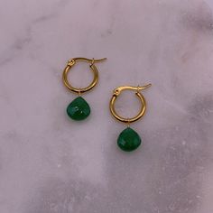 Materials: Stainless steel gold-plated hoop earrings, green onyx.  Sizing + Fit: 15mm hoops. Green Teardrop Nickel Free Hoop Earrings, Green Teardrop Nickel-free Hoop Earrings, Nickel-free Green Teardrop Hoop Earrings, Small Hoop Green Earrings For May Birthstone, Green Tarnish-resistant Huggie Jewelry, Nickel-free Teardrop Gold Plated Hoop Earrings, Green Teardrop Hoop Earrings, Green Small Hoop Huggie Earrings For May Birthstone, Small Green Pierced Hoop Earrings