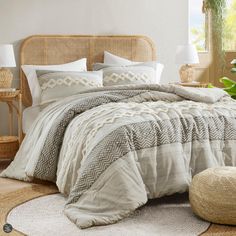 a bed in a bedroom next to a window with plants on the side and an ottoman