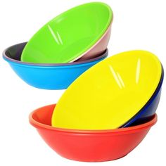 three bowls with different colored lids on them