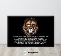 a lion with a quote on it sitting in front of a wall