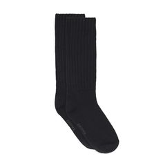 This thick and cozy cable knit slouch sock is warm, comfy, and oversized. | SKIMS Slouch Socks | Black | 6+ | Sock Bar Comfortable Cable Knit Winter Socks, Thick Cable Knit Casual Socks, Thick Casual Cable Knit Socks, Cozy Solid Color Knee-high Socks, Comfortable Ribbed Cozy Socks, Comfortable Cozy Ribbed Socks, Cozy Black Socks For Cold Weather, Cable Knit Socks, Slouch Socks