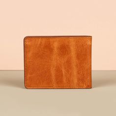 Features: Upgrade your everyday carry with our handcrafted Premium Leather Bifold Wallet, designed for those who appreciate both style and practicality. Made from high-quality, genuine leather, this wallet exudes luxury with its smooth finish and timeless design.  Ample Storage Secure & Convenient Durable Craftsmanship Slim & Compact  Whether you're dressing up for a special occasion or running daily errands, this wallet is a sophisticated addition to your accessories collection.  Care for your leather bifold wallet  Wipe with a soft cloth Use leather cleaner Apply leather conditioner Keep Dry Store in a Cool Place Avoid Overfilling Regular Use %100 Leather Care for your leather bifold wallet  Wipe with a soft cloth Use leather cleaner Apply leather conditioner Keep Dry Store in a Cool Pla Leather Card Holder For Everyday Carry, Leather Trifold Wallet With Waxed Finish For Everyday Use, Rectangular Leather Trifold Wallet For Everyday Use, Rectangular Wallets With Waxed Finish For Everyday Use, Everyday Carry Leather Card Holder With Smooth Grain, Leather Trifold Wallet With Card Slots For Everyday, Leather Card Holder With Waxed Finish, Leather Wallet With Rfid Blocking, Everyday Trifold Wallet With Waxed Finish