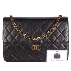 Authentic, pre-owned classic Chanel front flap bag with quilted calfskin leather. Features black quilted calfskin leather, this luxurious, runway-ready bag features woven-in felt chain strap and 24kt gold plated hardware accents. Its CC snap closure opens to a leather-lined interior with a zip pocket. This Chanel bag is the perfect size for all your essentials. Carry your wallet, cosmetics, cell phone, and more. You're going to love this bag! Ultra rare classic Chanel investment piece. Hologram Luxury Quilted Flap Bag, Classic Double Flap Bag With Chain Strap, Classic Quilted Flap Bag For Evening, Classic Quilted Evening Flap Bag, Designer Quilted Rectangular Flap Bag, Luxury Quilted Double Flap Bag, Classic Quilted Flap Bag For Formal Occasions, Formal Quilted Rectangular Flap Bag, Formal Rectangular Quilted Flap Bag