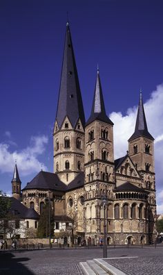 an old building with two towers on top