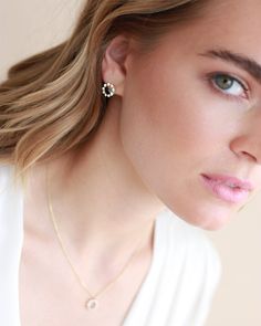 Dainty & minimalist, our Saylor CZ Circle Studs are the perfect way to add understated sparkle to any look. Designed with sterling silver or 18kt gold in a front facing hoop accented with CZ stones, you'll never want to take off these studs. Sterling silver, 18 karat gold plated Cubic zirconia 0.3" diameter Matching necklace here Hypoallergenic, lead-free & nickel-free Style #4346 Modern Everyday Jewelry With Single Cut Diamonds, Modern Jewelry With Single Cut Diamonds, Everyday Jewelry With Sparkling Cubic Zirconia Stones, Everyday Diamond Jewelry With Sparkling Stones, Everyday Classic Jewelry With Diamond Accents, Classic Everyday Jewelry With Diamond Accents, Classic Everyday Jewelry In Diamond White, Everyday White Cubic Zirconia Jewelry, Minimalist Everyday Jewelry With Sparkling Stones