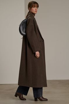 - Straight cut - Tailored collar - Double-breasted front - Two front flap pockets-Large back slit - Fluffy Woolen Fabric  This product runs large. We advise you to choose one size smaller than your usual size. Autumn Silhouette, Brown Coat Outfit, Brown Overcoat, September Fashion, Autumn Coat, Coat Classic, Coat Autumn, Brown Shade, Oversized Coat