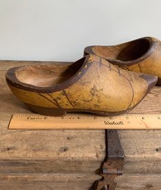 "This listing is for the vintage circa 1944 Belgium WW2 era wooden clogs. These are in used there are no noted chips or cracks just age and wear to the paint. The tip of each shoe reads Belgium 1944. These shoes are carved out of one piece of wood. Each shoe measures 8.8\" long x 3.25\" wide and 4\" tall. Please take a look at photos. Please follow our shop link for more vintage." Vintage Leather Sole Closed Toe Clogs, Vintage Leather Sole Slip-on Clogs, Vintage Brown Closed Toe Clogs, Vintage Clogs With Leather Sole And Closed Toe, Vintage Closed Toe Clogs With Leather Sole, Vintage Wooden Heel Closed Toe Clogs, Vintage Clogs With Wooden Heel And Closed Toe, Vintage Closed Toe Clogs With Wooden Heel, Vintage Clogs With Rubber Sole And Round Toe